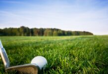 Wyndham Clark Dominates as Play Suspended Due to Darkness at US Open.